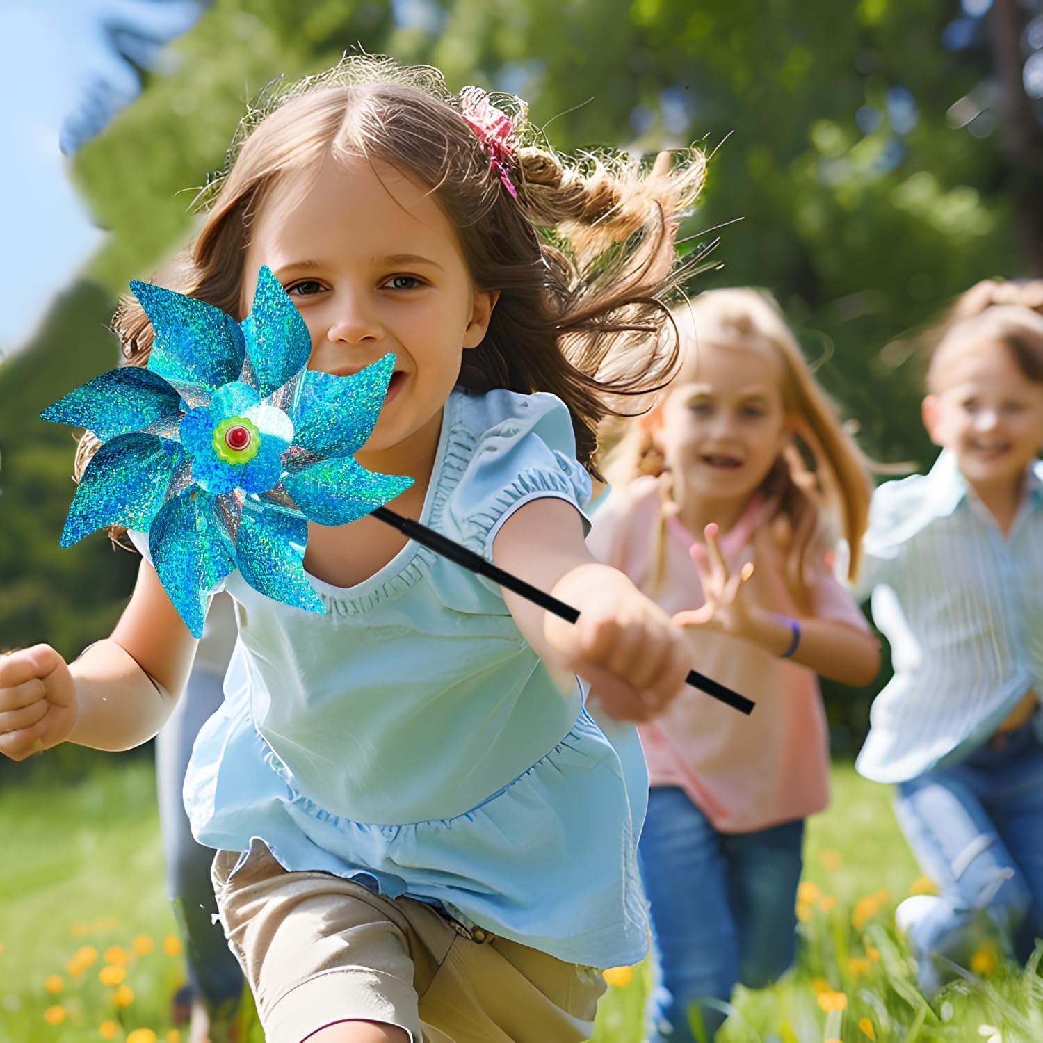 child with blue pinwheel